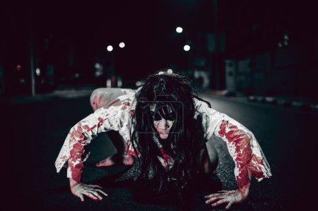 Photo for Horror woman concept,Ghost on the road in the city,A vengeful spirit on the street of the town,Halloween festival,Make up ghost face - Royalty Free Image