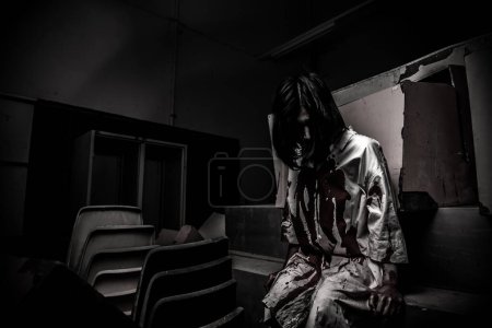 Photo for Portrait of asian woman make up ghost face,Horror scene movie,Scary background,Halloween poster,Thailand people - Royalty Free Image