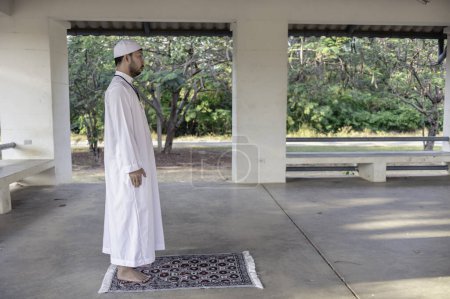 Photo for Asian islam man prayer. Young Muslim praying. Ramadan festival concept - Royalty Free Image