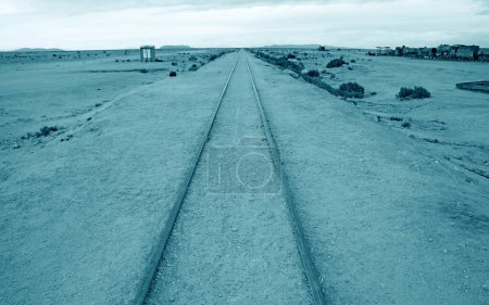 Photo for Pop Art Surreal Style Blue Colored Empty Old Railway Line in a Desert - Royalty Free Image