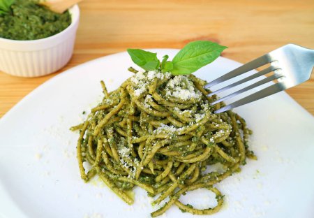 Plate of Mouthwatering Spaghetti with Homemade Pesto Sauce