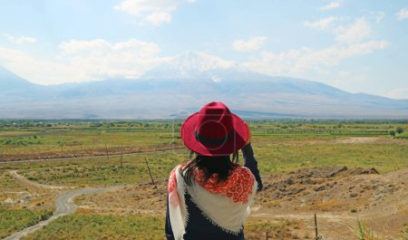 Photo for Woman Looking at Beautiful Mount Ararat, the Mountains Described in the Bible as the Resting Place of Noah's Ark, Armenia - Royalty Free Image