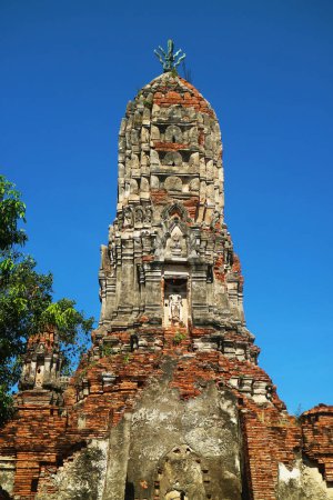 Photo for Ancient Prang-shaped Pagoda of Wat Choeng Tha Buddhist Temple in Ayutthaya, Thailand - Royalty Free Image