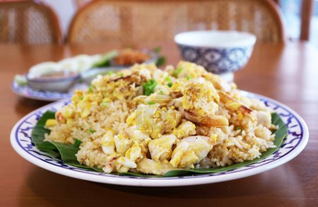 Photo for Popular Thai Dish of Khao Pad Poo or Fried Rice with Crab Meat - Royalty Free Image