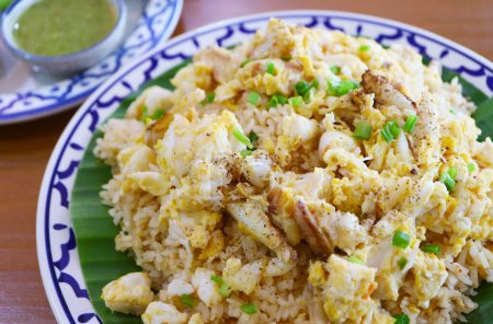 Photo for Mouthwatering Thai Dish of Crab Meat Fried Rice or Khao Pad Poo - Royalty Free Image