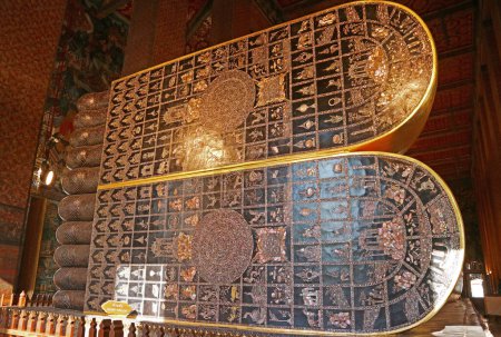 Photo for Soles of Reclining Buddha's Feet in Wat Pho Temple, Inlaid 108 Auspicious Symbols with Mother of Pearl, Bangkok, Thailand - Royalty Free Image