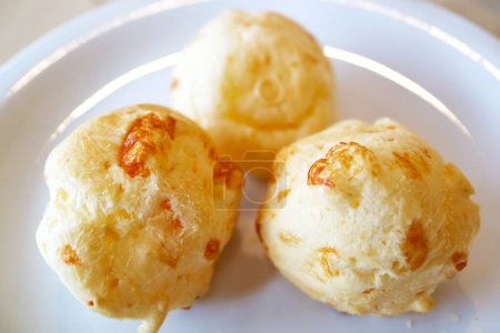 Closeup of Tasty and Chewy Pao de Queijo, Traditional Brazilian Cheese Breads