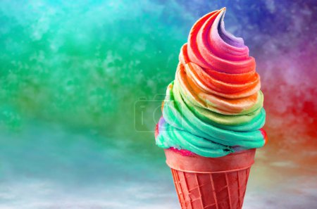Delectable Rainbow Colored Soft Serve Ice Cream Cone Isolated on Multi-color Backdrop