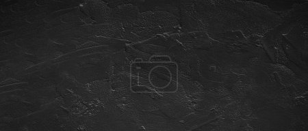 Foto de Fondo de pared de cemento negro y texturizado - Imagen libre de derechos