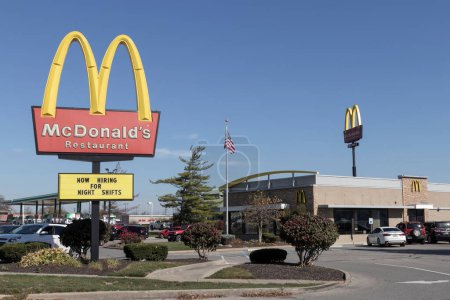 Photo for Brownsburg - Circa November 2022: McDonald's Restaurant. McDonald's is offering employees higher hourly wages, paid time off, and tuition payments. - Royalty Free Image