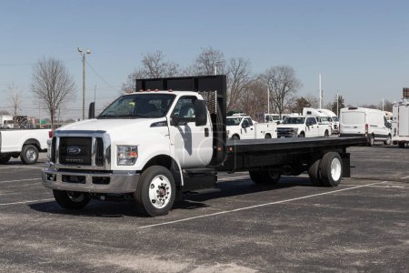 Photo for Indianapolis - Circa March 2023: Ford F-650 Commercial Flatbed truck. Ford offers the F650 with gas or diesel engines. - Royalty Free Image