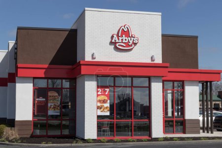 Photo for Avon - Circa April 2023: Arby's fast food Location. Arby's operates over 3,300 roast beef and meat sandwich restaurants. - Royalty Free Image