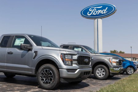 Photo for Logansport - Circa April 2023: Ford F-150 display at a dealership. The Ford F150 is available in XL, XLT, Lariat, King Ranch, Platinum, and Limited models. - Royalty Free Image