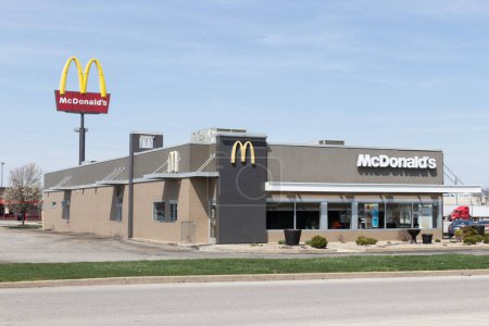 Photo for Lafayette - Circa April 2023: McDonald's Restaurant. McDonald's is offering employees higher hourly wages, paid time off, and tuition payments. - Royalty Free Image
