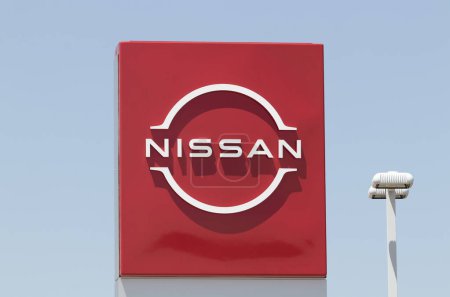 Photo for Champaign - Circa June 2023: Nissan Car, SUV and Pickup Truck dealership. Nissan manufactures the Sentra, Altima and Versa. - Royalty Free Image