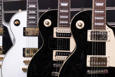 Photo for Muncie - July 10, 2023: Les Paul guitar display at a music store. Les Paul guitars are versatile for many music styles from Jazz to Blues to Rock. - Royalty Free Image