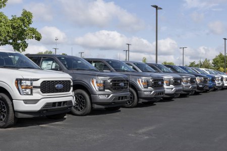 Photo for Zionsville - July 21, 2023: Ford F-150 display at a dealership. The Ford F150 is available in XL, XLT, Lariat, King Ranch, Platinum, and Limited models. - Royalty Free Image