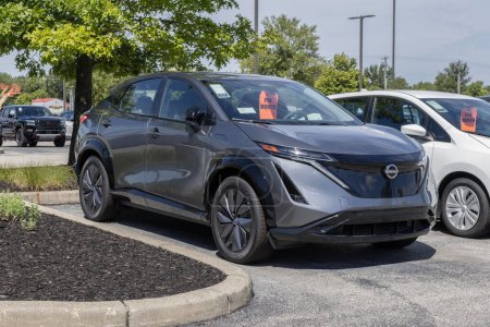 Photo for Fishers - August 13, 2023: Nissan Ariya EV display at a dealership. Nissan offers the Ariya as a new Electric Crossover SUV. - Royalty Free Image