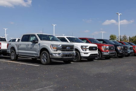 Photo for Plainfield - October 1, 2023: Ford F-150 display at a dealership. The Ford F150 is available in XL, XLT, Lariat, King Ranch, Platinum, and Limited models. - Royalty Free Image