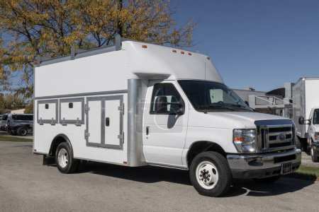 Photo for Fishers - October 22, 2023: Used Ford E-350 Cutaway with Enclosed Service Body. Ford offered the E-350 with a Triton 5.4L V8 Engine. - Royalty Free Image