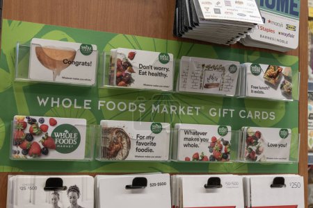 Photo for Carmel - December 7, 2023: Whole Foods Market Gift Cards. Whole Foods Market offers local, organic, plant-based foods and groceries. - Royalty Free Image