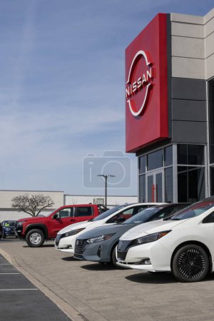 Photo for Indianapolis - March 24, 2024: Nissan Car, SUV and Pickup Truck dealership. Nissan manufactures the Sentra, Altima and Versa. - Royalty Free Image