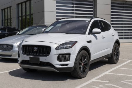 Photo for Indianapolis - April 14, 2024: Used Jaguar E-Pace display. With pricing issues, Jaguar is selling preowned vehicles to meet demand. MY:2020 - Royalty Free Image