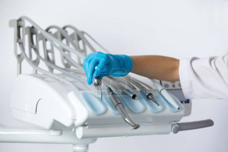 Photo for Dental health care concept background - Different stomatology instruments and tools in a dentists office - Royalty Free Image