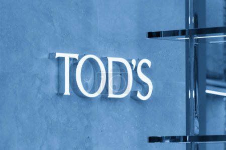 Photo for NEW YORK, USA - MAY 15, 2019: Tods store sign. Tods Group is an Italian company which produces luxury shoes and other leather goods. logo on exterior wall of store - Royalty Free Image