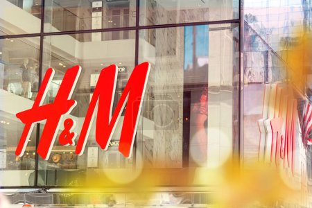 Photo for NEW YORK, USA - MAY 15, 2019: close up shot of H M logo. H M Hennes Mauritz AB is a Swedish multinational retail-clothing company, known for its fashion clothing - Royalty Free Image