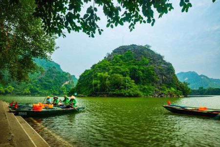 Photo for Boat on the Trang An river path, tour at Trang An, Vietnam - Royalty Free Image