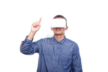 Photo for Man wearing virtual reality headset isolated on white background,  trying finger to touch screen something - Royalty Free Image