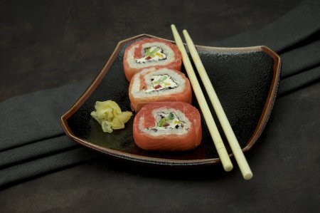 Photo for A set of delicious sushi on dark background - Royalty Free Image