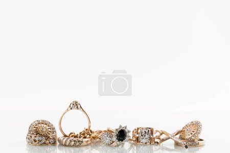 Photo for Golden jewerly isolated on the white background - Royalty Free Image