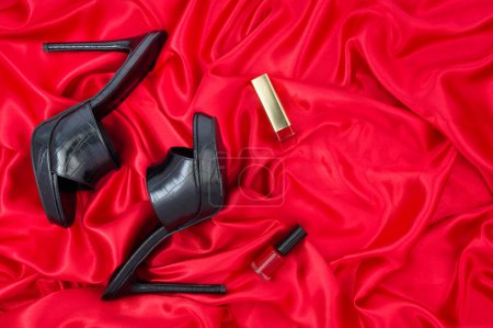 Photo for High heel shoes  on a red background - Royalty Free Image