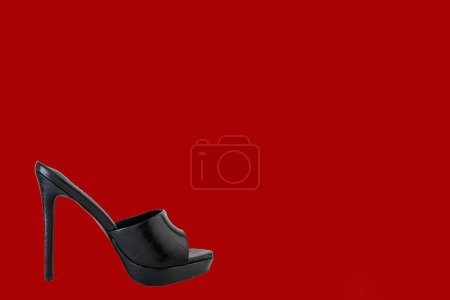 Photo for High heel shoes  on a red background - Royalty Free Image