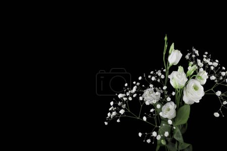 A bouquet of bright and colorful flowers on dark background