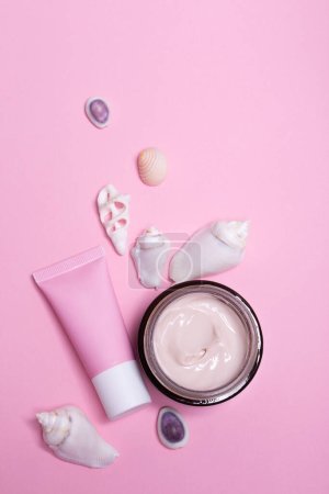 Photo for Beauty background with facial cosmetic products with empty copy space. Makeup, skin care concept with pastel colored background. High quality photo - Royalty Free Image