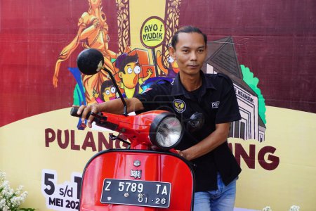 Photo for The rider of the scooter at panjalu scooter fest. - Royalty Free Image