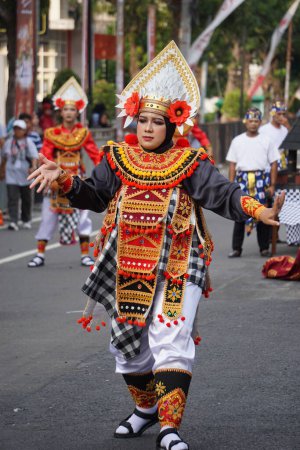 Photo for Baris dadap dance from Bali at BEN Carnival . This dance is a sacred dance that repels evil - Royalty Free Image
