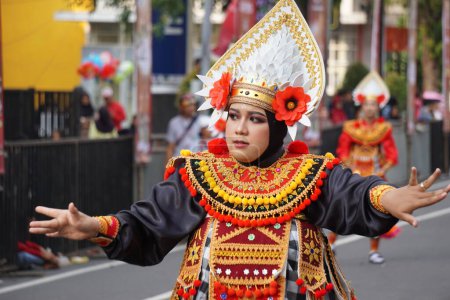 Photo for Baris dadap dance from Bali at BEN Carnival . This dance is a sacred dance that repels evil - Royalty Free Image