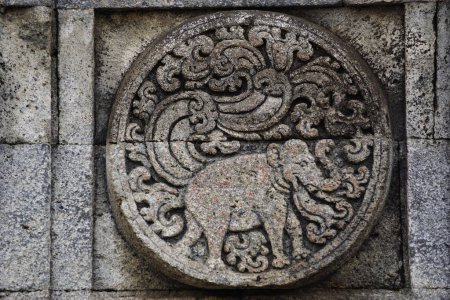 Photo for Medallion in the penataran temple with animal reliefs. - Royalty Free Image