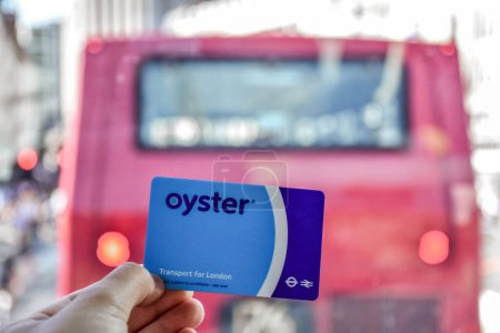 Photo for London, England - July 07 2017: Oyster card and red doubledecker in London - Royalty Free Image