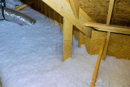 An eco wool insulation is installed on roof of new home for insulation attic