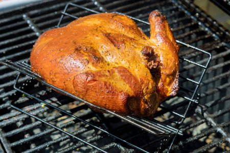 Photo for On BBQ grill we prepare traditional homemade roast and smoked whole chicken in traditional way - Royalty Free Image