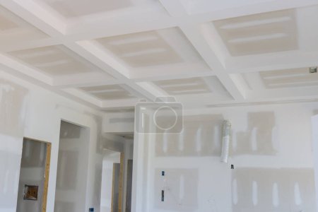 Téléchargez les photos : We have completed plastering drywalling of new house that is under construction it is now ready to be painted - en image libre de droit