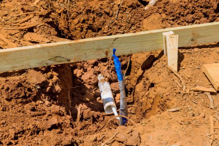 Photo for As part construction new home utilities sewer pipes and water pipes were laid under foundation of house - Royalty Free Image