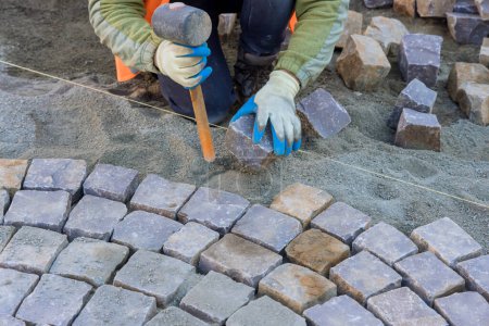Industrial cobblestones were being used to create beautiful and sturdy pavement.