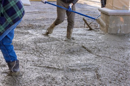 Photo for Pouring of wet concrete was done in stages to avoid any cracks. - Royalty Free Image