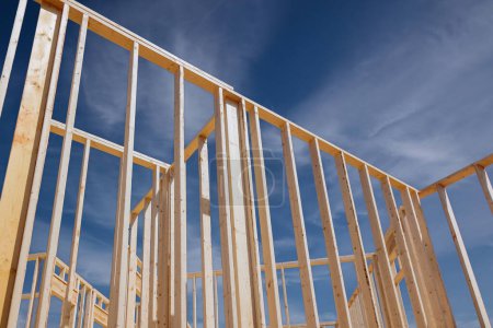 Construction frame house of wooden beam stick framework on new build home